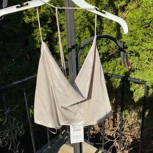 Zara dainty open back shiny top. Low cut front.